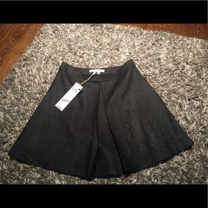 Pleated black BCBG Generation mini skirt